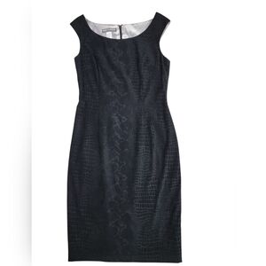 Maggy London Sleevless Black Dress. Fitted and Lined. Textured Material Sz 12